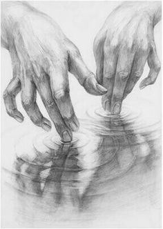 two hands touching each other with their fingers on top of a glass bowl in front of them