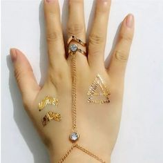 Rhinestone Hand Bracelet Women Chain Link Finger Ring Gold Charm Jewelry For Women Size 6.7" Finger Chains, Dainty Metal Chain Bracelet For Parties, Elegant Gold Alloy Body Jewelry, Gold Body Jewelry With Jewels For Party, Gold Alloy Body Jewelry For Party, Gold Alloy Body Jewelry Gift, Party Crystal Bracelet With Adjustable Chain, Alloy Party Bracelet, Metal Crystal Bracelet With Adjustable Chain For Party