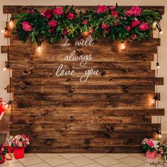 a wooden sign with flowers and lights on it that says i love you always have you