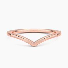 a rose gold ring with an open v design on the front and side, set against a white background