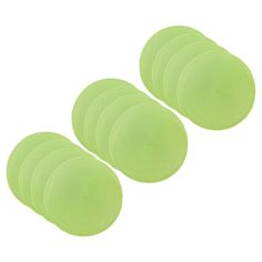 four green discs on a white background