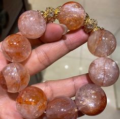 Material: Natural Red Hematoid Lepidocrocite Quartz beads  size :  20mm   quantity: one strand 6mm approx 29 pcs one strands 7mm approx25 pcs one strands 8mm approx 22 pcs one strands 9mm approx 21pcs one strands 10mm approx 19 pcs one strands 11mm approx 18pcs one strands 12mm approx 16 pcs one strands 13mm approx 16 pcs one strands 14mm approx 15 pcs one strands 15mm approx 14pcs one strands 16mm approx 14 pcs one strands 17mm approx 13pcs one strands 18mm approx 13pcs one strands 19mm approx 12pcs one strands 20mm approx 12pcs one strands PLEASE NOTE: 1.Due to lighting effects, monitor's brightness/contrast settings etc, there could be some slight differences in the color tone of the pictures and the actual item. 2.Each piece of natural crystal is unique, the imperfections add natural c Orange Crystal Bracelet As Gift, Orange Round Crystal Bracelet Gift, Gift Orange Crystal Bracelet, Women Bracelet, Quartz Beads, Natural Red, Bracelet Jewelry, Colour Tone, Natural Crystals