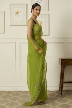 Lime green saree with thread embroidered border in floral pattern. Paired with matching padded blouse. - Aza Fashions Green Sleeveless Pre-draped Saree For Festive Season, V-neck Saree With Resham Embroidery For Diwali, Traditional V-neck Georgette Saree, Green Chanderi Saree For Reception, Traditional Georgette Saree With V-neck, Green Chikankari Pre-draped Saree For Diwali, Green Chanderi Pre-draped Saree With Chikankari Embroidery, Green V-neck Set For Diwali, Green Sleeveless Traditional Wear With Resham Embroidery