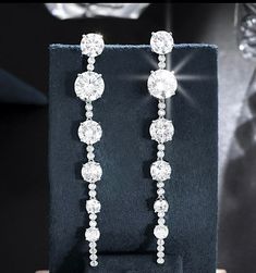 New to our Bella CollectionAnother beauty, glamorous simple, elegant and beautiful long drop swarovski crystal earrings. approx 3 1/2 " long pierced--------------------------------------------(add elegant classic tennis bracelet at discounted price) *Note processing time is not shipping time, our regular Free shipping takes approx. 5-6 days to receive after shipped. With rush processing your order is expedited and you will also be upgraded to priority mail approx 2-3 days to arrive once shipped Elegant Sparkling Long Drop Chandelier Earrings, Cubic Zirconia Drop Linear Earrings For Evening, Elegant Long Drop Chandelier Earrings With Sparkling Stones, Elegant Dangle Linear Crystal Earrings, Elegant Dangle Crystal Earrings, Elegant Crystal Dangle Earrings, Evening Dangle Cubic Zirconia Linear Earrings, Evening Cubic Zirconia Dangle Linear Earrings, Evening Cubic Zirconia Dangle Earrings