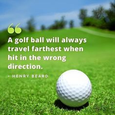 a golf ball sitting on top of a lush green field next to a quote from henry beard