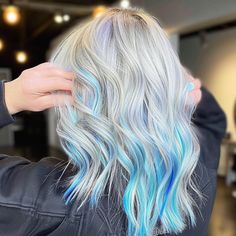 Icy Blue Streaks in Platinum Blonde Hair Platinum Blonde With Color Highlights, Blonde And Turquoise Hair Highlights, Blue Hair Highlights Blonde, Blue Streaks In Blonde Hair, Blonde Hair With Blue Streaks, Blue Highlights In Blonde Hair, Blonde With Blue Highlights, Blonde Hair With Blue Tips