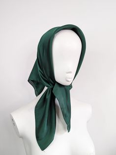 Green satin headscarf Luxury modern bohemian satin headscarf. This is made from a soft synthetic blend satin fabric. The fabric is luxurious and lightweight. This scarf is versatile and can be worn in many ways around the neck or head. It is large enough to be tied around the head to give full coverage, or to be draped around the neck.  This is a square scarf that can be folded to create the triangle look, or wrapped up and tied in a knot to be worn as a headband. Style: Head scarf Measurements: Green Headscarf, Green Head Scarf, Bandana Hair Wrap, Style Head Scarf, Head Scarf Vintage, Style Bandana, Bandana Hair, Cape Costume, Silk Headscarf