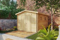 a small wooden shed sitting next to a brick wall