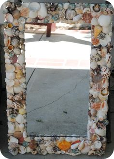 there is a mirror made out of seashells