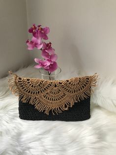 This straw summer bag is made with natural and black paper rope. The inside of this crochet clutch is lined. It is lightweight and durable. This straw summer bag is made with crochet. I made this black evening bag for women who want to look trendy and stylish. You can use it in the evening or during the day. The clutch's measures approx ; Width: 11 inches (28 cm) Height: 7 inches (18 cm) This straw summer clutch bag is great gift for bridesmaid, birthday, mother's day, and other special occasions for lovely one.  Material : Paper Rope Care : Do not wash. Wipe it with a clean damp cloth. Leave to dry in a place away from direct sunlight Note : If you want a different color please message me. Thank you for visiting my shop! Bohemian Black Shoulder Bag For Beach Season, Black Bohemian Shoulder Bag For Beach Season, Handmade Black Beach Bags, Handmade Black Bags For Beach Season, Handmade Black Shoulder Bag For Beach Season, Black Handwoven Crochet Bag For Beach Season, Rectangular Straw Bag With Macrame For Beach, Black Crochet Pouch Bag For Vacation, Black Rectangular Crochet Bag For Beach Season