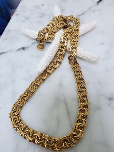 Beautiful Givenchy heavy goldtone chain with the Givenchy logo. Chain drop is 11 inches. Measures 25 inches to the end of the logo. Appox. 1/2 inch wide. Any questions or information I have not covered in my description please ask. Check out my wife's etsy shop Arlettemichelle and my son John's shop Jmoriginalart just put their shop name in the etsy search bar all one word. Big Gold Chains, Disco Hair, Givenchy Jewelry, Givenchy Logo, Shop Name, Bridal Jewelry Collection, Gold Chains For Men, Search Bar, One Word