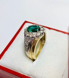 Beautiful Vintage 14k Yellow Gold Natural Oval Shape Emerald Ring 100% Natural Emeralds Emerald(s) 1.00CT Diamond: 0.80CT Color: G Clarity: SI1 Total ring weight: 5.2GR Ring sizing available free of charge For more information regarding this item feel free to reach me so I can accommodate your needs. Thank you Luxury Oval Cluster Ring In Yellow Gold, Luxury Green Oval Cluster Ring, Classic White Gold Diamond Ring With Oval Cabochon, Luxury Oval Yellow Gold Emerald Ring, Luxury Oval Emerald Ring In Yellow Gold, Luxury Oval Cabochon 14k Stamped Rings, Luxury 14k Stamped Oval Cabochon Ring, Luxury Stamped 14k Oval Cabochon Ring, Luxury Oval Signet Ring With Brilliant Cut