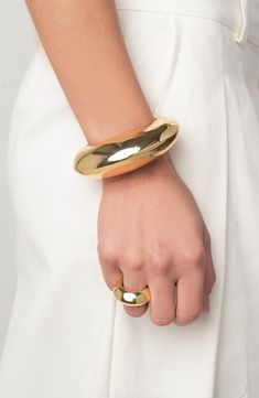 This domed bangle plated in 14-karat gold can help build the perfect stack or shine solo for easy everyday gleam. 14k-gold plate Imported Hispanic & Latinx Owned/Founded Latest Bracelets, Gold Bracelet Cuff, A Perfect Circle, Brass Jewelry, Smokey Quartz, Jewelry Plate, Put On, Cuff Bracelet, Anklets