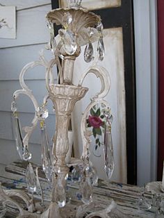 a crystal candelabra sitting on top of a table