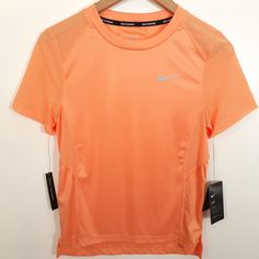 Nike Women’s Dri Fit Miler Running Training Short Sleeve Shirt Top Orange Small Nwt Measurements (Approximate And Laying Flat): Chest (Pit To Pit): 18.5 In Length: 23 In ****Please Measure Similar Item Before Purchase**** Sold As Pictured. Thanks For Looking! By Purchasing, Buyer Is Fully Aware Of The Item Condition As Described/Stated Above. Any Questions Regarding The Item, Please Message Us. Sku: A9-1215 Nike Orange Sports Top, Orange Short Sleeve Workout Top, Nike Orange Short Sleeve Tops, Aztec Shirt, Beige Sweatshirt, Tops Nike, Crewneck Sweatshirt Women, Running Tank Tops, Tracksuit Jacket