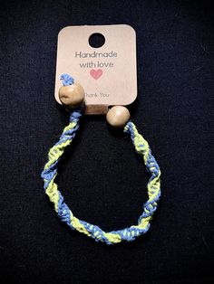 Blue and yellow hemp thread bracelet with wooden beads Thread Bracelets, Blue Bracelet, Braided Bracelets, Wooden Beads, Thread, Friendship Bracelets, Jewelry Bracelets, Yellow, Beads