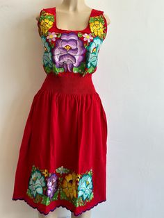 100% Authentic Mexican Dress  This Dress is gorgeous. Once size fit up to Large Color: Red This dress can feet up to XLarge This dress has elastic an the waist  Ebroidery Mexican Dress.Boho Chic Dress Folk Fabric Flowers Mexican Tunic Traditional Embroidery This Dress is perfect for those beach day or any occasion This Dress is meant to provide extreme comfort throughout the day The perfect gift for her Red Folk Style Maxi Dress, Red Sundress With Floral Embroidery, Summer Vacation Red Embroidered Dress, Red Bohemian Embroidered Cotton Dress, Red Bohemian Cotton Embroidered Dress, Folk Style Red Maxi Dress, Red Embroidered Sundress, Red Embroidered Dress For Summer Vacation, Red Embroidered Summer Maxi Dress