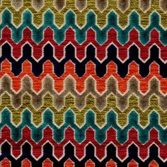 an image of a multicolored knitted fabric textured with wavy lines and zigzags