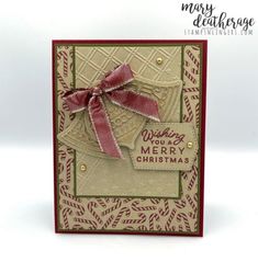 a christmas card with a bow on it