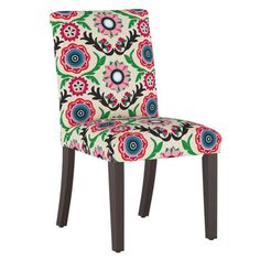 an upholstered chair with colorful flowers on it