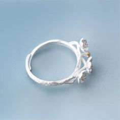 Limited Stock Available - Click "ADD TO CART" To Get Yours Now Gorgeous flower ring made of 925 sterling silver. This Plum Blossom Flower Ring Personality Fashion Trendy Women Ring from Arimonz could make you become more fresh and attractive. Very cute and elegant fits your finger well. You can wear it to parties or daily use, will not fade even if you wear it for a long time. Specifications: Metals Type: Silver Metal Stamp: 925,Sterling Package Includes: 1*Plum Blossom Flower Ring Personality F Delicate Silver Flower Open Ring, Silver Promise Flower Ring, Silver Flower Ring For Promise, Adjustable Silver Flower Ring In Fine Jewelry Style, Adjustable Silver Flower Ring Fine Jewelry, Sterling Silver Open Flower Ring For Promise, White Gold Open Flower Ring, Sterling Silver Promise Flower Ring, Silver Birth Flower Ring For Anniversary