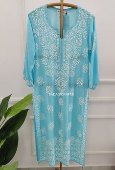 DESCRIPTION ▪ Fabric: Modal ▪ Sleeves: 3/4 Sleeves ▪ Style: Straight Kurti ▪ Length: 44-46 Inches ▪ Occasions: Casual Wear, Office Wear, Festive Wear ▪ Garment Care: Hand Wash Only ▪ Net Content: Only Kurti Spring Blue Georgette Kurta, Blue Georgette Kurta For Summer, Summer Blue Georgette Kurta, Light Blue Chikankari Bollywood Dress, Light Blue Bollywood Dress With Chikankari Embroidery, Blue Straight Kurta With Chikankari Embroidery, Blue Chikankari Embroidery Straight Kurta, Blue Chikankari Embroidered Straight Kurta, Blue Anarkali Kurta For Spring