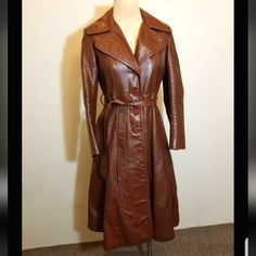 Reposhing This Item I Purchased. Closer To A Size 6 Even Though Items Says Size 14. Retro Long Coat For Fall, Vintage Long Sleeve Leather Jacket For Fall, Vintage Leather Jacket With Long Sleeves For Fall, Vintage Brown Outerwear For Work, Fall Vintage Fashion Single-breasted Outerwear, Retro Long Sleeve Leather Jacket For Work, Vintage Single Breasted Long Coat, Brown Vintage Fashion Outerwear For Fall, Brown Outerwear For Fall Vintage Fashion