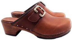 Leather Slip-on Clogs With Buckle Closure, Brown Leather Clogs With Buckle Closure, Brown Leather Footbed Clogs With Open Heel, Brown Leather Mules With Buckle Closure, Classic Slip-on Clogs With Buckle, Leather Mules With Tang Buckle And Round Toe, Classic Slip-on Clogs With Buckle Closure, Leather Clogs With Buckle Closure And Round Toe, Classic Brown Clogs With Buckle Closure