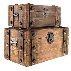 two wooden trunks stacked on top of each other with handles and latches in the middle