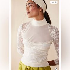 Delicate And Dainty, This Turtleneck From Intimately Features A Lacy Bodice And ¾ Length Sleeves, Complete With A Flattering Back Cut Out For A Special Touch. Fit: Formfitting Features: Turtle Neckline, Lace ¾ Sleeves, Lace Bodice, Mesh Inlay, Open Back Cut Out Why We <3 It: This Stunning Top Can Truly Be Worn In Any Season. Intimately Our Softest Intimates And Best-Ever Base Layers. Intimately Is An In-House Label. Care/Import Machine Wash Cold Import Contents 90% Nylon, 10% Spandex Measurement White Stretch Lace Top For Layering, Fitted White Lace Top For Layering, Elegant Fitted Lace Top For Brunch, Feminine Fitted Lace Top For Brunch, Fitted Feminine Lace Top For Brunch, Fitted Cream Top For Brunch, Fitted Cream Tops For Brunch, Elegant White Lace Top For Layering, Fitted Lace Top For Brunch