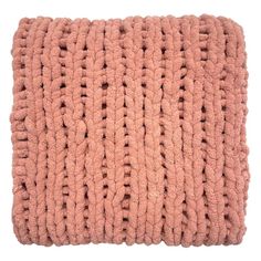 a pink pillow with braiding on the front and back side, isolated against a white background