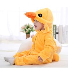 Lovely baby one-piece bird duck dress up hooded jumpsuit costume for newborn, infant & toddler boys and girls. Long sleeve hoodie coverall outerwear to keep arms and legs warm. Banded cuffs to keep sleeve from riding up. Zip closure from neck to ankle. Nickel free metal parts to prevent skin irritation. Made from softest cotton against delicate skin. Clothing is machine wash safe. More sizes are available for this baby clothing set. Winter Costume, Animal Onesie, Toddler Pajamas, Little Duck, Baby Rompers, Pink Rabbit, Flannel Material, Cozy Fashion, Girls Jacket