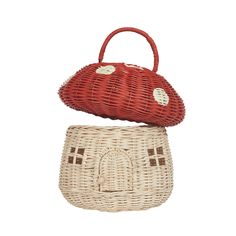 two wicker purses sitting on top of each other, one with a red bag