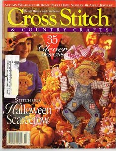 the front cover of cross stitch and country crafts magazine, featuring an image of a teddy bear