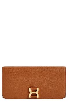 The iconic topstitching and tassel accent linked to the Marcie line distinguish this '70s-inspired leather wallet with a well-organized interior. Snap-flap closure Dual interior compartments with center zip-pocket divider; currency pockets; 12 card slots Leather Made in Italy Designer Handbags This brand has B Corp certification, representing business practices with emphasis on social and environmental performance, accountability and transparency This brand meets Nordstrom Responsible Brands cri Classic Leather Rectangular Wallet On Chain, Classic Leather Wallet On Chain, Classic Rectangular Leather Wallet On Chain, Classic Leather Wallet On Chain With Magnetic Closure, Leather Wallet On Chain For Workwear, Classic Leather Wallet On Chain For Travel, Elegant Brown Leather Wallet On Chain, Leather Rectangular Wallet For Work, Classic Tan Wallet On Chain For Formal Occasions