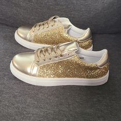 Brand New Gold Sparkly Shoes. Size 37 (6.5). Gold Synthetic Sneakers For Summer, Gold Synthetic Sneakers For Spring, Gold Synthetic Summer Sneakers, Trendy Gold Sneakers For Party, Trendy Gold Party Sneakers, Spring Party Slip-on Sneakers, Party Sneakers Lace-up Synthetic, Casual Party Sneakers With Round Toe, Trendy Flat Sneakers For Party