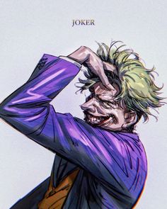 the joker is holding his head with both hands