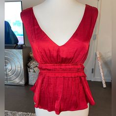 This Top Is Brand New With Tags Still On It From The Brand Storia. It’s A Vibrant Red Color With Silky Material. In Perfect Condition And Originally Cost $48. Elegant Red V-neck Tops, Red V-neck Tops For Evening, Red V-neck Evening Tops, Elegant Red Tops For Date Night, Elegant Red Top For Date Night, Red Sleeveless Top For Date Night, Chic Red V-neck Top, Chic Red Tops For Date Night, Summer Red Blouse For Night Out