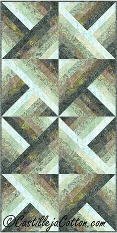 a close up of a quilt on the side of a table top with an image of a