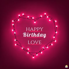 a heart shaped birthday card with the words happy birthday love written on it and lights in the shape of a heart