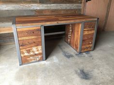 a desk made out of wood and metal