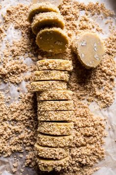 an image of crackers with peanut butter on the top and ground next to them