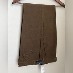 I Am Selling A Brand New, Never Worn Pair Of Brown Corduroy Brooks Brothers Trousers. They Are Size 34 Regular, Hemmed To 32.5 Plain Bottom. The Fit Is Regent Which Is Their Modern Tailored Fit. Fitted Corduroy Tapered Leg Pants, Fitted Corduroy Pants With Tapered Leg, Fitted Tapered Leg Corduroy Pants, Brown Flat Front Cotton Pants, Brown Cotton Flat Front Pants, Classic Brown Corduroy Pants, Brown Flat Front Cotton Bottoms, Brown Cotton Flat Front Bottoms, Classic Corduroy Tapered Leg Bottoms