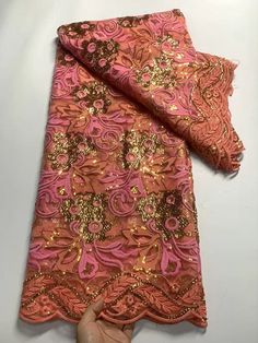 elevate your designs with our exquisite Lace Fabric. this  lace fabric is perfect for wedding gowns, evening dresses, and other special occasion outfits. Explore our collection now and unleash your creativity. Elegant Pink Dupatta With Sequins, Elegant Pink Sequined Dupatta, Elegant Fitted Embroidered Fabric For Ceremony, Elegant Pink Lace For Party, Glamorous Fitted Pink Dupatta, Elegant Pink Lace Tulle Fabric, Elegant Pink Embroidered Lace, Elegant Tulle Fabric With Intricate Embroidery, Pink Crochet Lace For Party