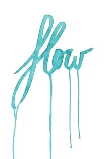 the word slow written in blue paint on a white background with long, thin sticks sticking out of it