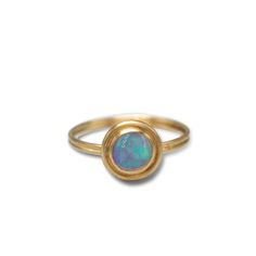 Gold & Stone Ring - This ring boasts a unique Violet Crystal Opal, originating in Australia. Its set in buttery 18K gold and stands out with a brushed finish. Make this the ring you never take off! Available in a size 7.5 Periwinkle Ring, Gold Stone Ring, Violet Crystal, Opal Ring Gold, Crystal Opal, Artful Home, Gold Stone, Opal Ring, Opal Crystal