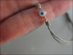 All you need to be protected. A tiny, cutie evil eye bracelet. This little eye is 5mm and is vermeil rose gold framed. It is adjustable, it has a cord with a sliding knot for a perfect fit. This listing is for 1 bracelet, choose your favorite color! Available on sterling silver: https://www.etsy.com/listing/167252932/sterling-silver-evil-eye-bracelet-choose Available on gold: https://www.etsy.com/listing/115747490/evil-eye-bracelet-on-a-string Gold Evil Eye Bracelet, Sliding Knot, Eye Bracelet, Evil Eye Bracelet, Miami Fl, Charm Bracelets, Gold Frame, Evil Eye, Belly Button Rings