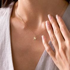 Discover the elegance of our 14K solid gold star necklace, designed to add a touch of celestial charm to any outfit. This beautiful gold star pendant necklace is perfect for those who appreciate minimalist jewelry with a timeless appeal. Handcrafted with care, this dainty necklace features a delicate star charm, making it a versatile piece for everyday wear or special occasions.    Whether you’re searching for a gift for her, a wedding gift, a valentine gift, or a mothers day gift, this gold nec Elegant Star-shaped Charm Necklace For Everyday, Gold Star Necklace, Gold Star Pendant, Star Necklace Gold, Star Charm Necklace, Gold Necklace Simple, Star Pendant Necklace, Rose Gold Pendant, Christmas Gift For Her