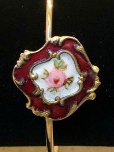 "This is delicate, wearable piece of art features a beautiful enamel/metal antique button mounted on a gold-colored bangle bracelet.   The dainty button features a hand-painted rose with ruby-colored border and is 3/4\" x 3/4\".    Bangle bracelet is nickel-free.  Would be a great & unique birthday, anniversary, Mother's Day or just because gift.  Also perfect for a little self-retail therapy." Vintage Rose Brooch Jewelry, Vintage Rose Jewelry With Brooch, Victorian Rose Gold Bracelets Gift, Victorian Rose Gold Bracelets As Gift, Adjustable Vintage Rose Jewelry, Victorian Rose Design Jewelry For Formal Occasions, Adjustable Vintage Pink Jewelry, Adjustable Enamel Bracelets For Formal Occasions, Formal Adjustable Enamel Bracelets