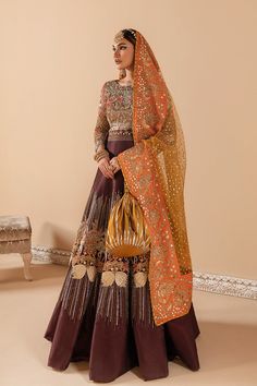 Raw Silk Lehenga and Net Choli Bridal Wedding Dress is a stunning attire adorned with Hand-crafted details of Sequins, Motifs, and Pipes. Fast Shipping. Traditional Floor-length Wedding Dress With Dupatta, Semi-stitched Wedding Dress With Pallu For Eid, Semi-stitched Floor-length Gown For Traditional Ceremonies, Traditional Saree Wedding Dress For Reception, Hand Embellished Floor-length Organza Traditional Wear, Bollywood Style Wedding Dress With Pallu For Eid, Traditional Wedding Dress With Dupatta, Traditional Hand Embellished Floor-length Salwar Kameez, Traditional Saree Wedding Dress With Intricate Embroidery